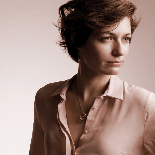 Business portrait in sepia of a woman with short hair